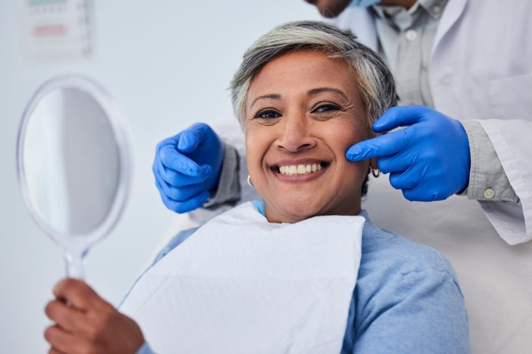 Smiling patient at her dental routine appointment