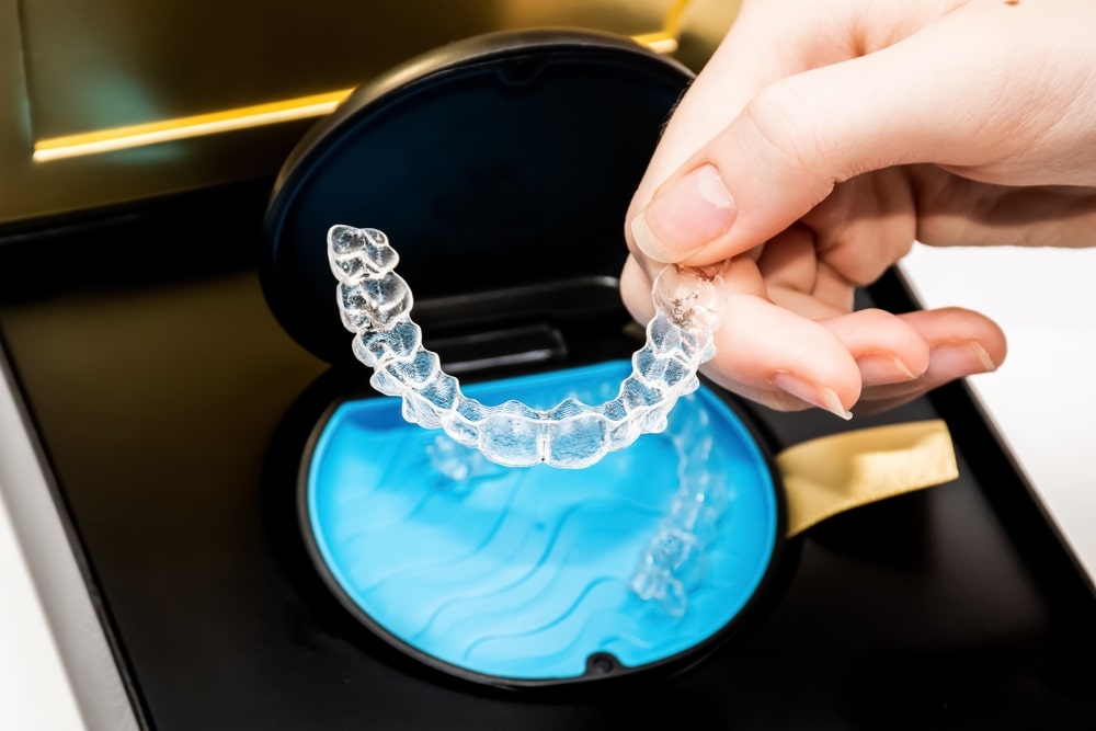 Invisalign_invisible_braces_Lasalle Invisalign aligners in a woman's hand